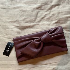 INC burgundy clutch